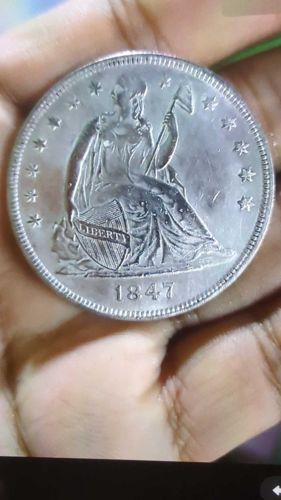 Seated Liberty Dollar