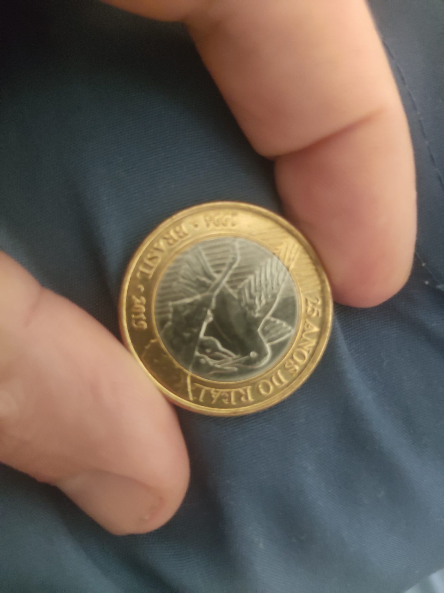 1 Real - 25 Years of the Real Commemorative — reverse