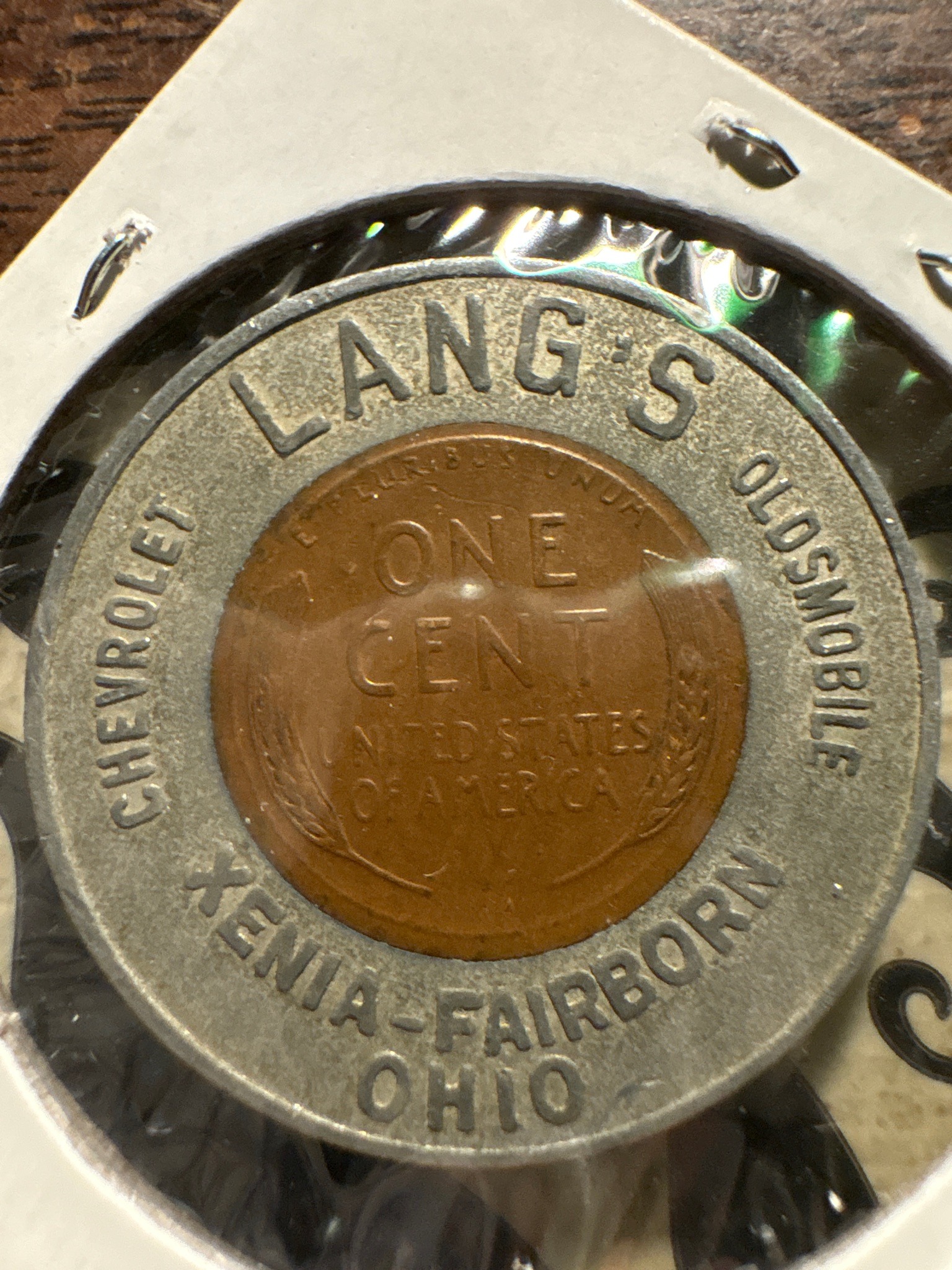 Encased 1955-D Lincoln Wheat Cent (Lang's Chevrolet Oldsmobile Advertising Token) — reverse