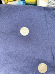 South African 1 Rand (bottom coin); Australian 5 Cents (top coin)