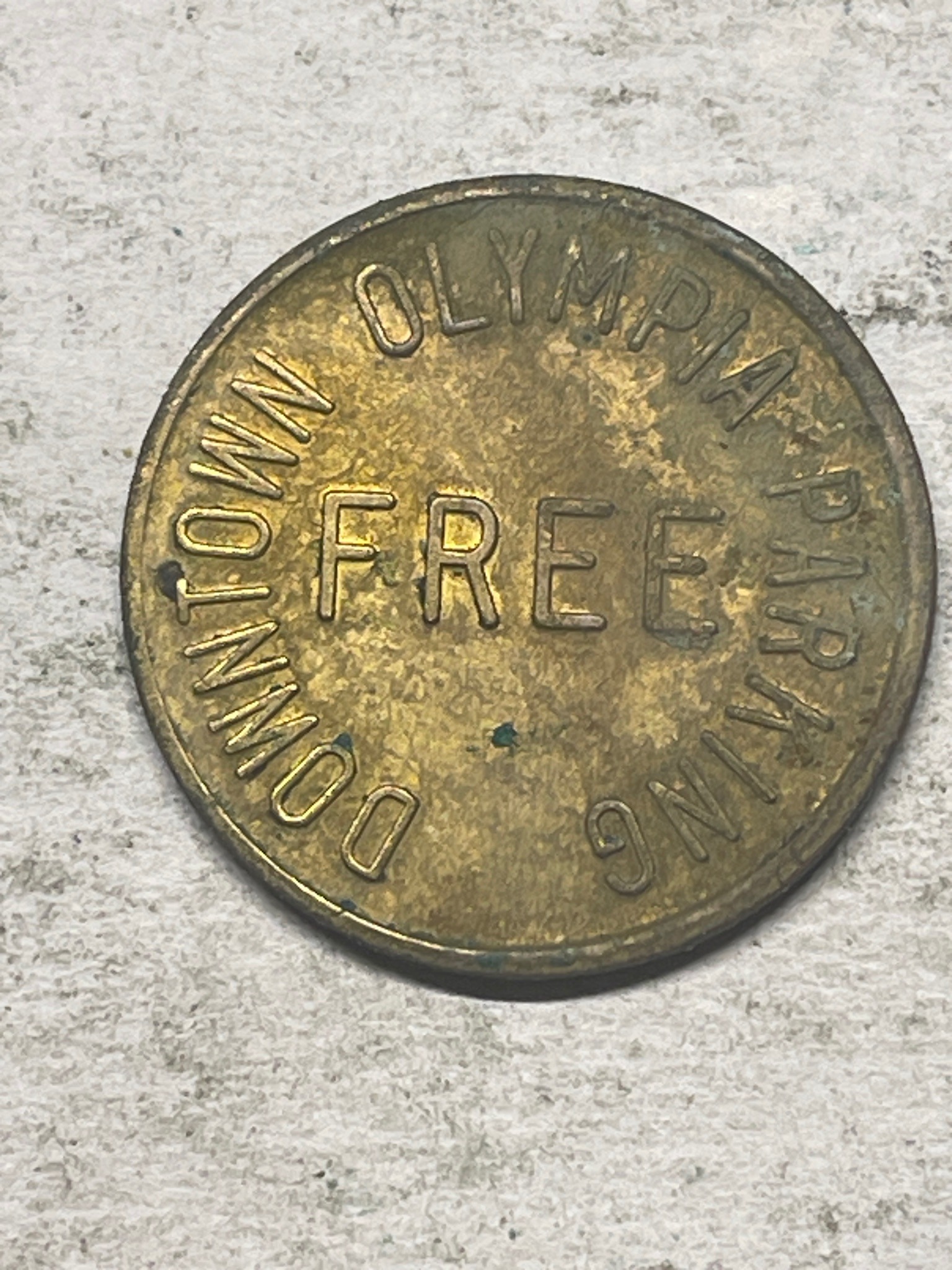 Downtown Olympia Free Parking Token — reverse