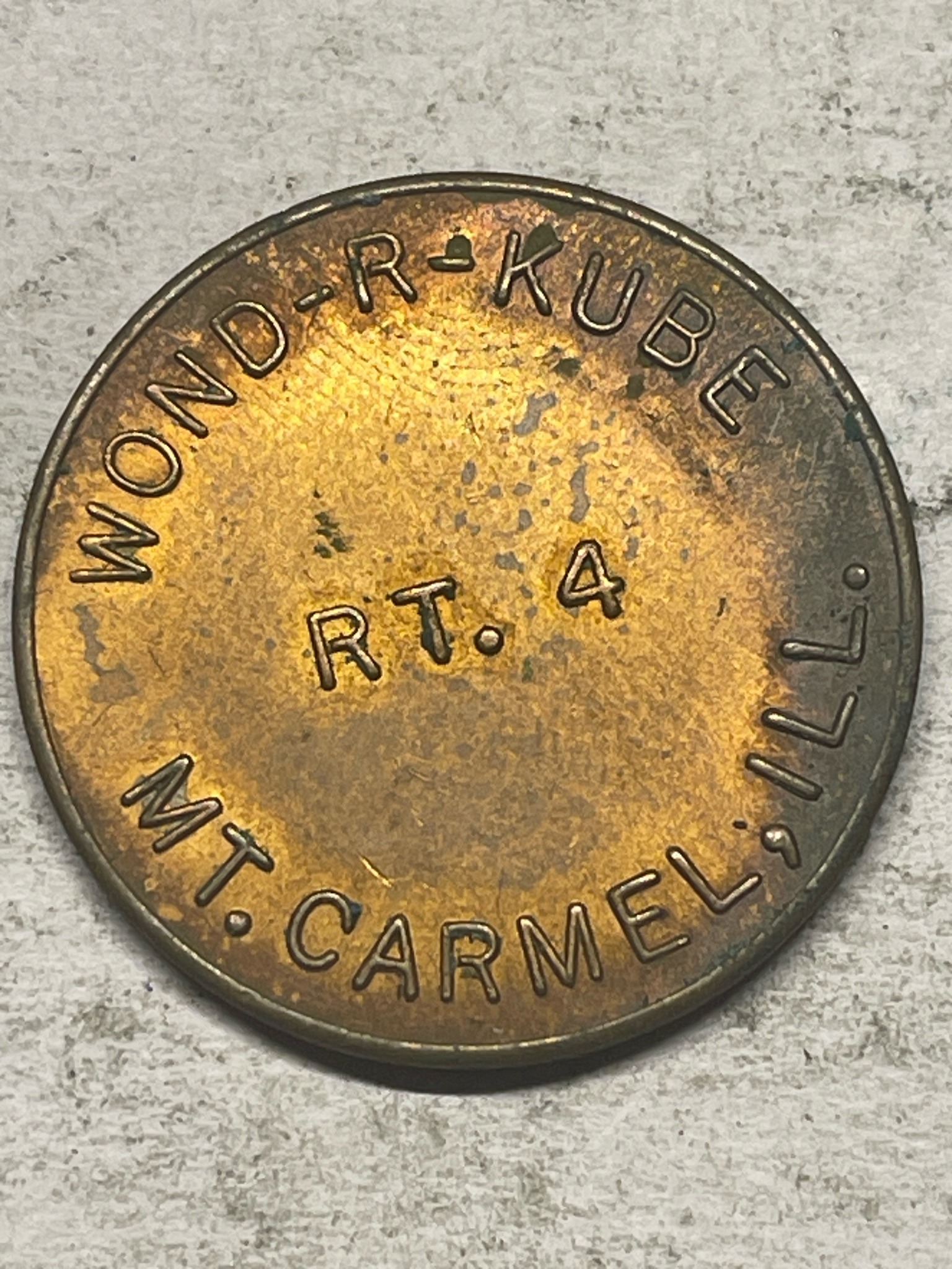 Wond-R-Kube / Meter-All Trade Token — obverse